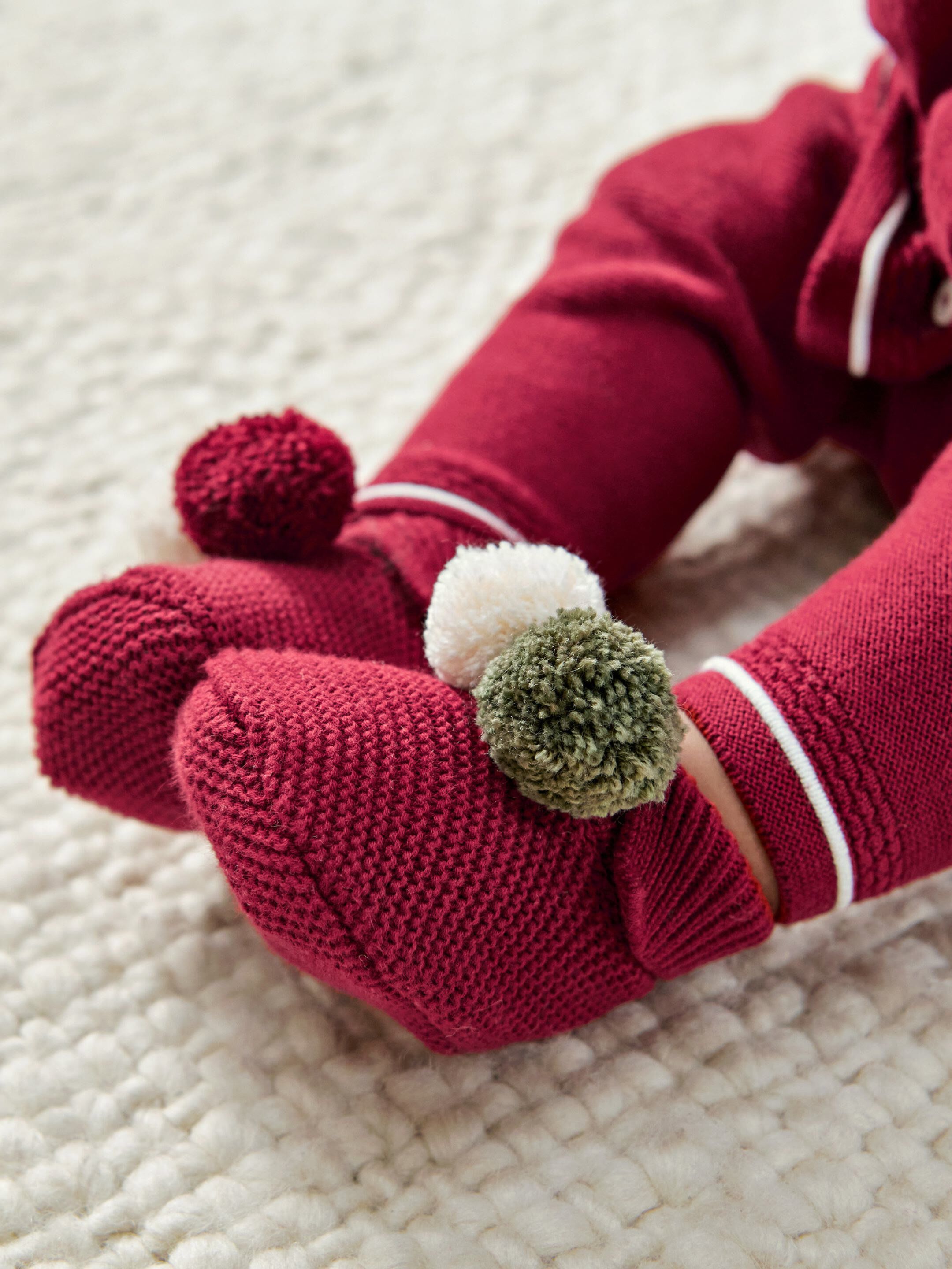 Knitted Pom Pom Booties image number 1